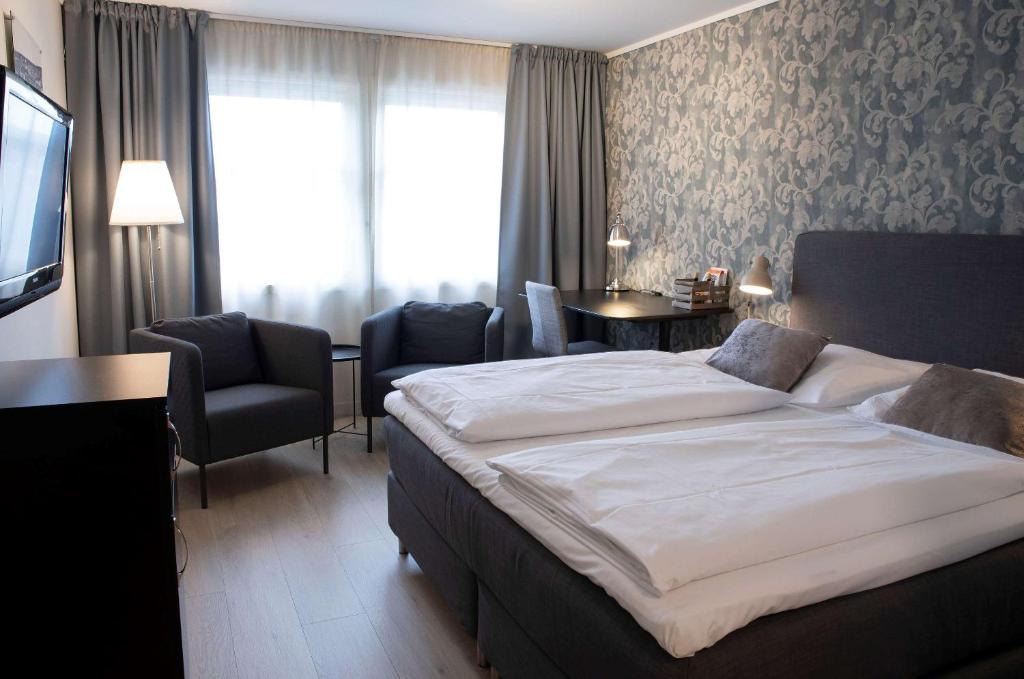 Postel nebo postele na pokoji v ubytování Best Western Tingvold Park Hotel