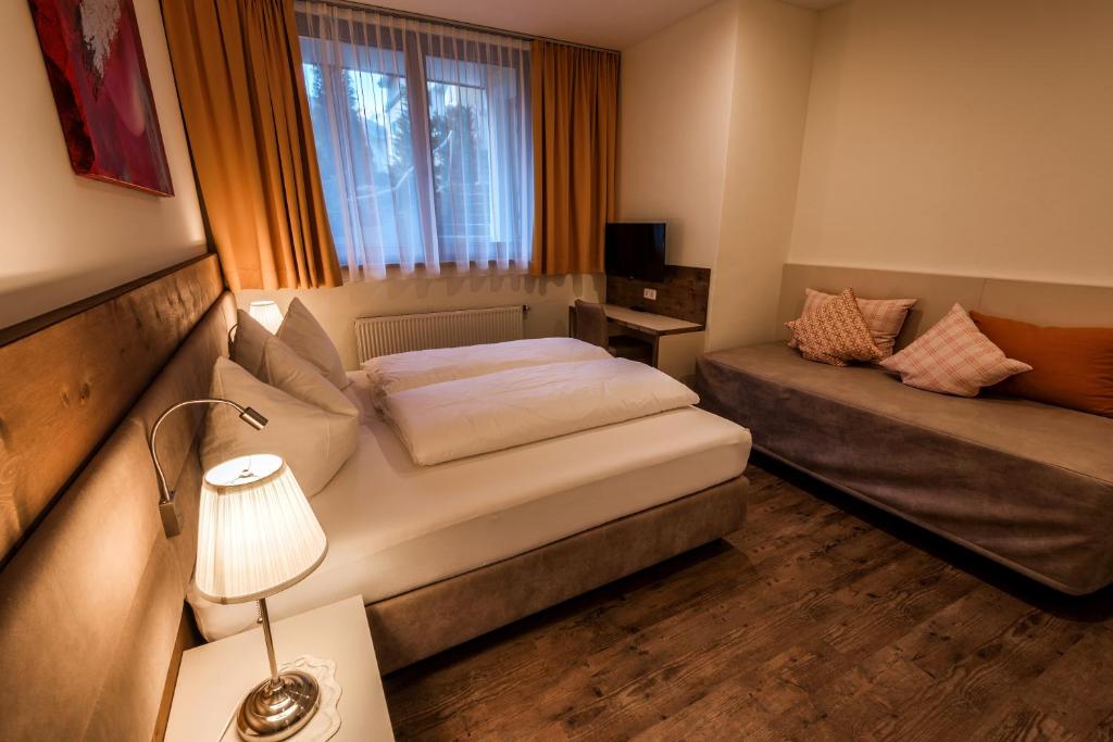 Posteľ alebo postele v izbe v ubytovaní Hotel-Appartement Ferienhof