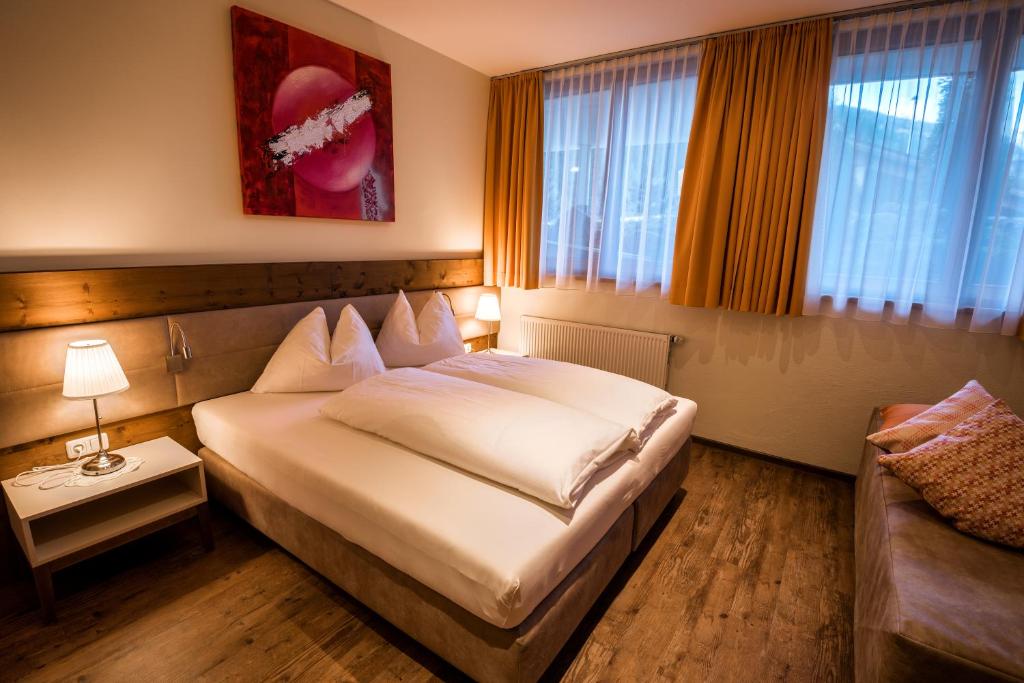 Posteľ alebo postele v izbe v ubytovaní Hotel-Appartement Ferienhof