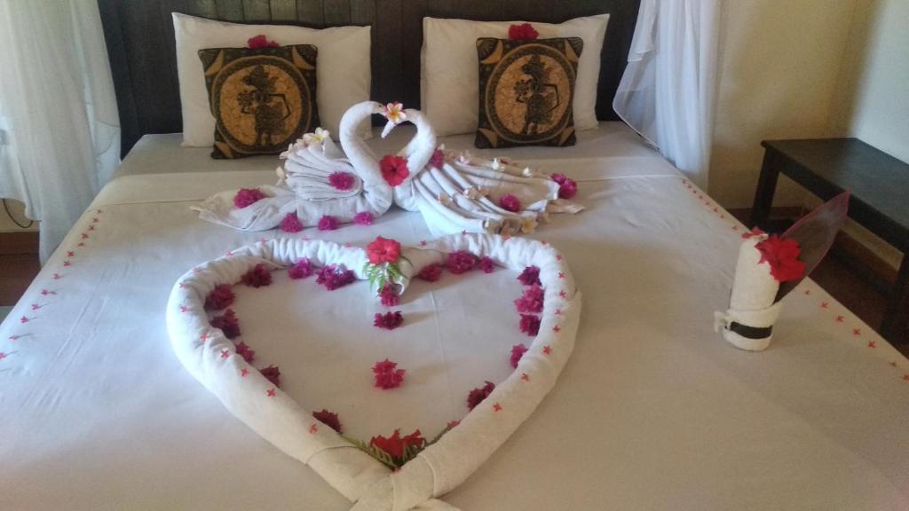 Postel nebo postele na pokoji v ubytování Ode Resto Guesthouse