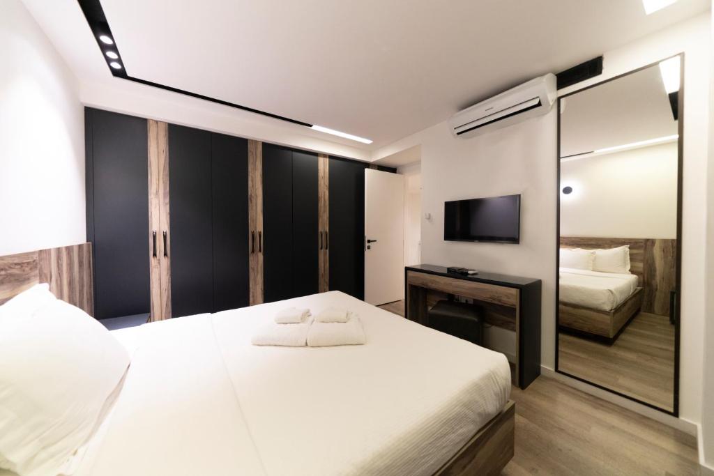 Postel nebo postele na pokoji v ubytování Loft 29 Residence