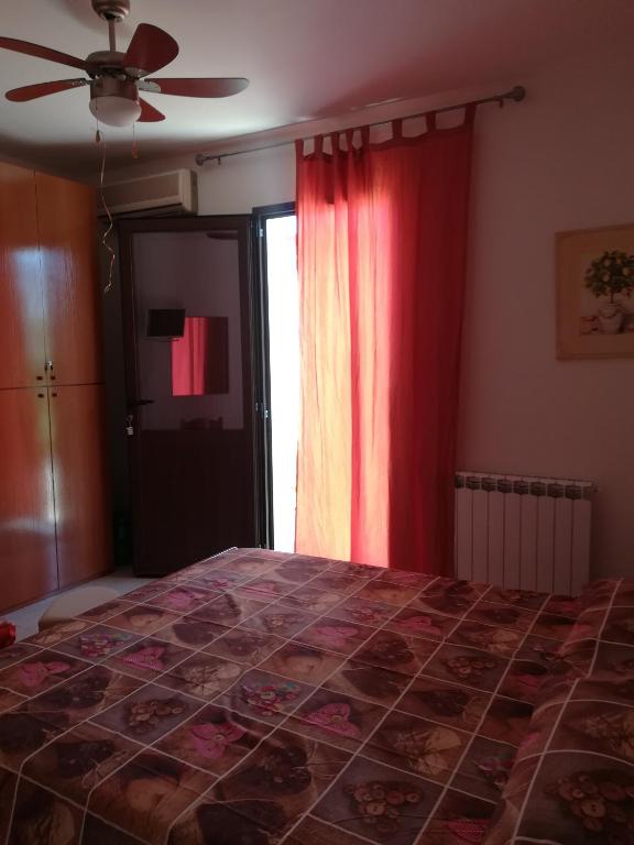 Postel nebo postele na pokoji v ubytování B&B Zia Delia