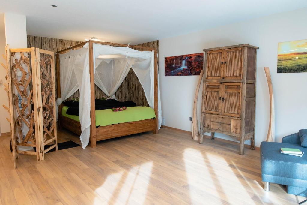 Postel nebo postele na pokoji v ubytování Apartment Schwarz Waldperle