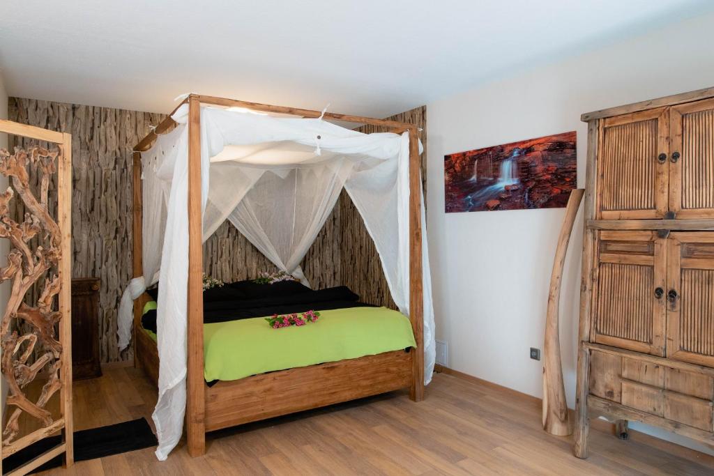 Postel nebo postele na pokoji v ubytování Apartment Schwarz Waldperle