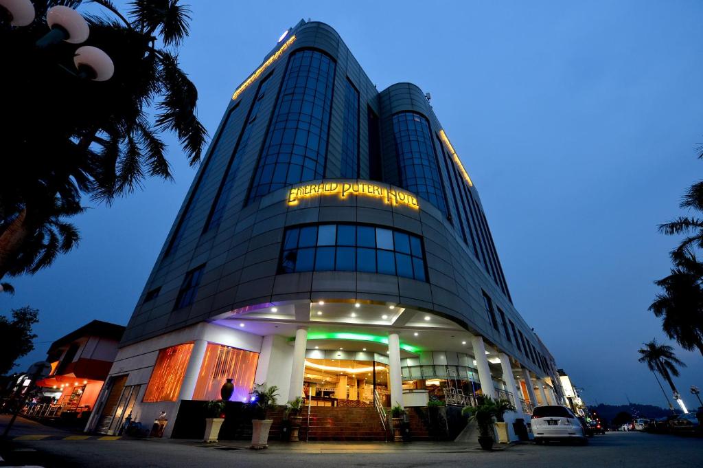 a building with a sign on the front of it at Emerald Puteri Hotel in Sungai Petani