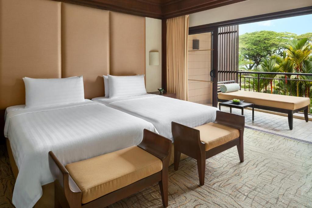 Postel nebo postele na pokoji v ubytování Shangri-La Rasa Sayang, Penang