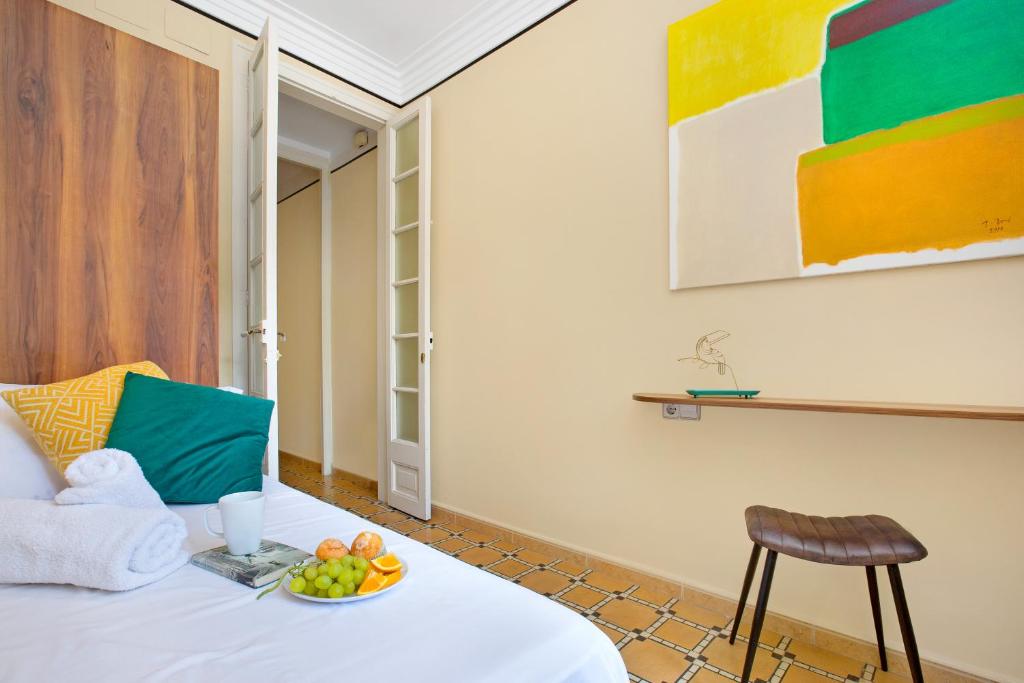 A bed or beds in a room at Stay U-nique Apartments Floridablanca