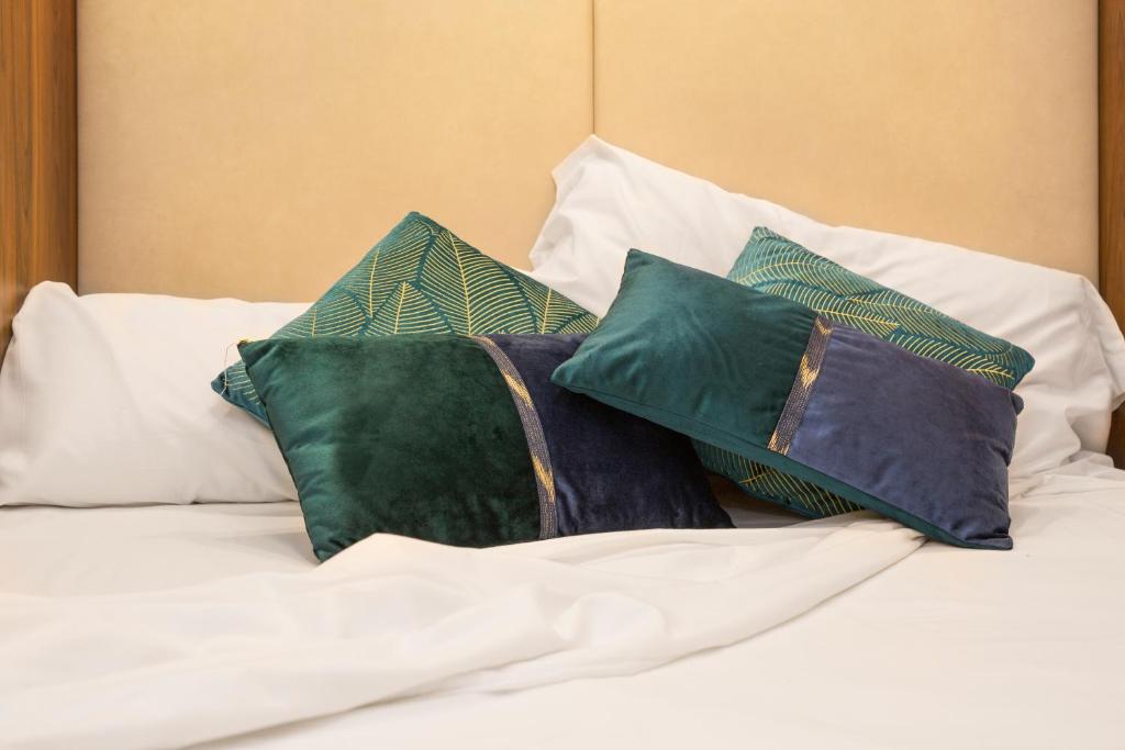 A bed or beds in a room at Stay U-nique Apartments Floridablanca
