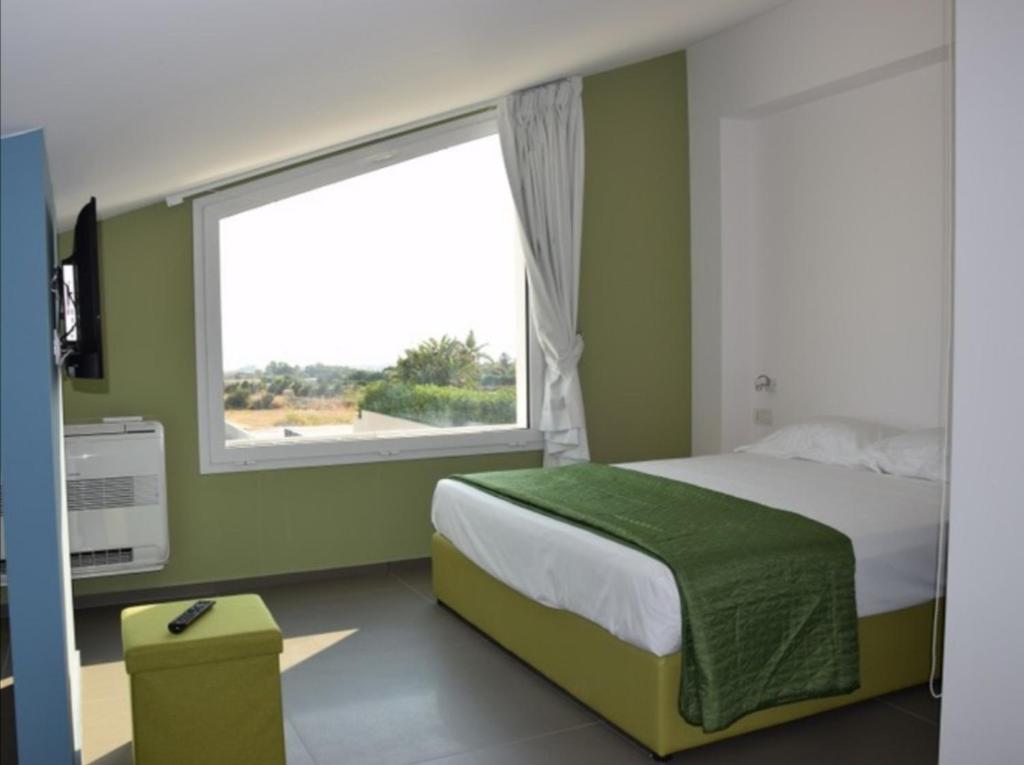 Voodi või voodid majutusasutuse Villa Arillà con piscina e padel toas