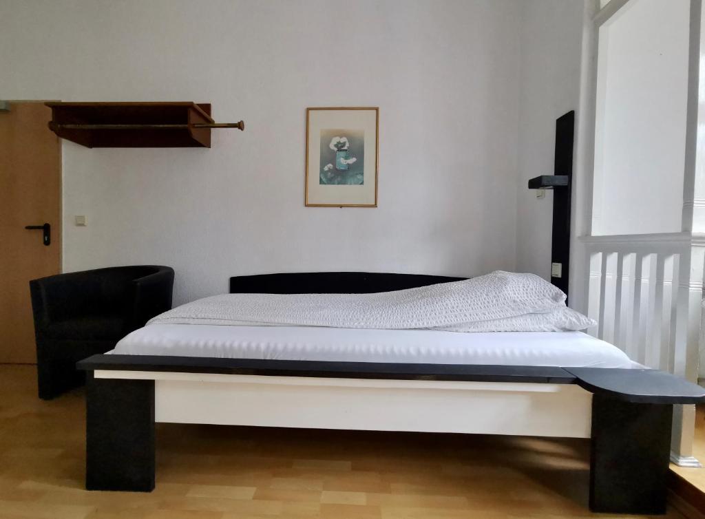 Ein Bett oder Betten in einem Zimmer der Unterkunft Pension Akropolis