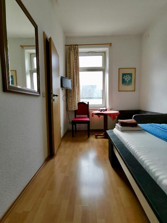 Ein Bett oder Betten in einem Zimmer der Unterkunft Pension Akropolis