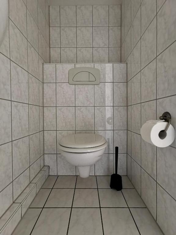 Ein Badezimmer in der Unterkunft Pension Akropolis