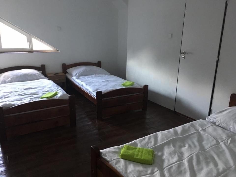 Łóżko lub łóżka w pokoju w obiekcie Penzión Brabčák