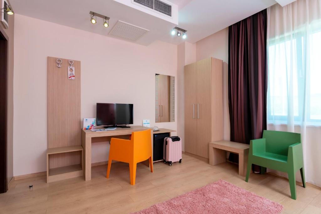 TV a/nebo společenská místnost v ubytování West City Hotel