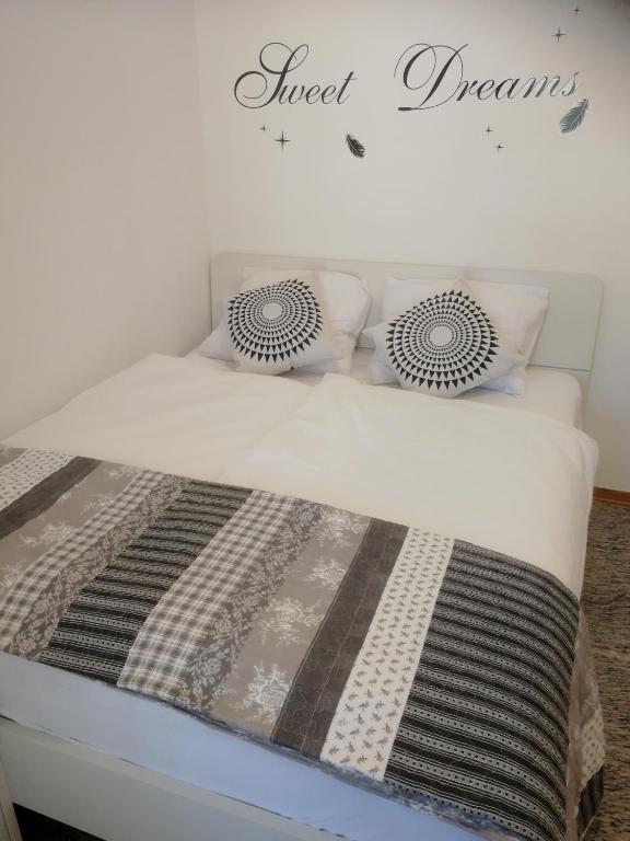 Postel nebo postele na pokoji v ubytování Apartma ROK