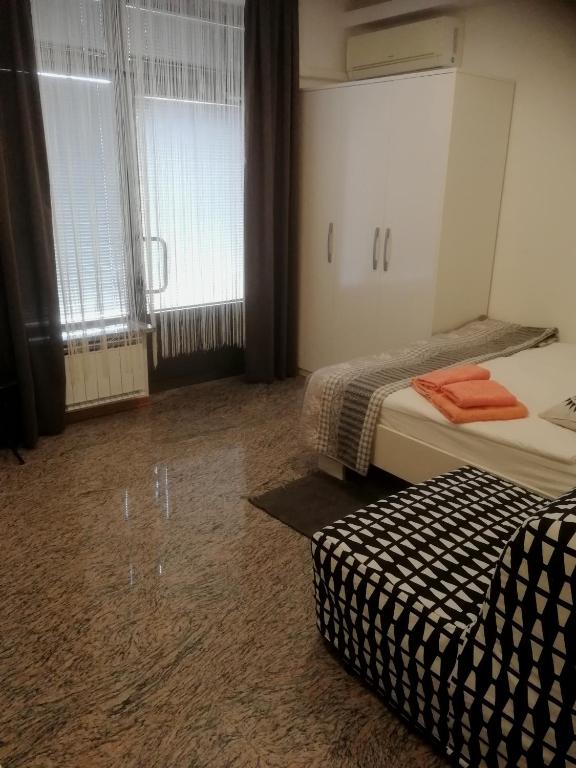 Postel nebo postele na pokoji v ubytování Apartma ROK