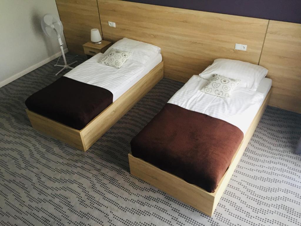 Postel nebo postele na pokoji v ubytování Nova Stodola