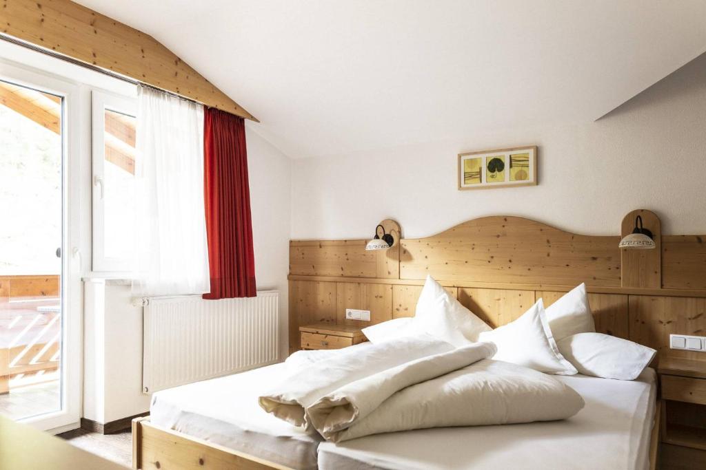 Postel nebo postele na pokoji v ubytování Bäckelar‘s Apart