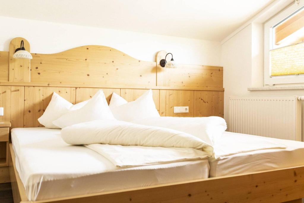 Postel nebo postele na pokoji v ubytování Bäckelar‘s Apart