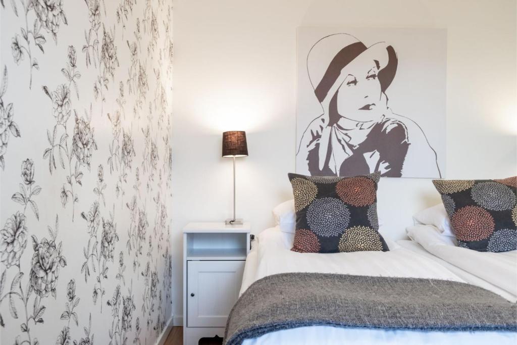 Postel nebo postele na pokoji v ubytování EttSmart Hotell