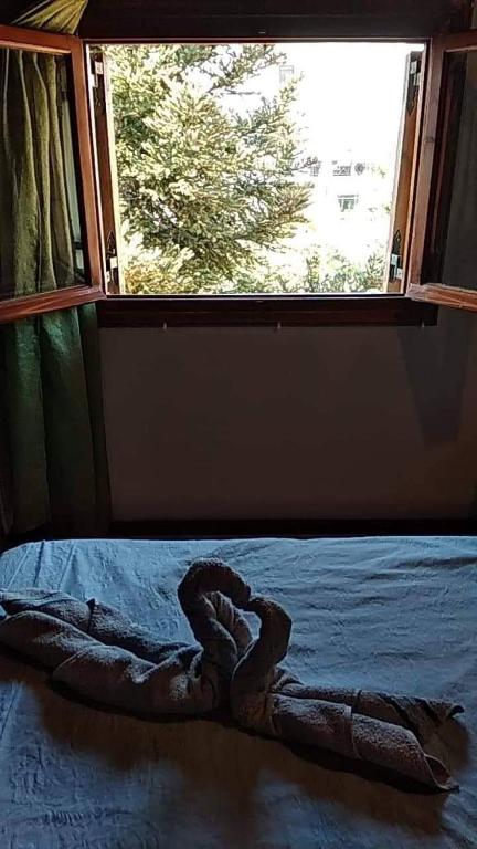 Postel nebo postele na pokoji v ubytování Villa Axiothea