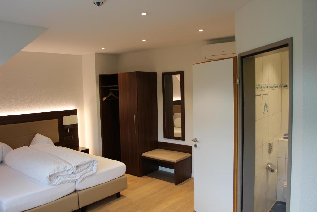 Postel nebo postele na pokoji v ubytování Seehotel Delphin
