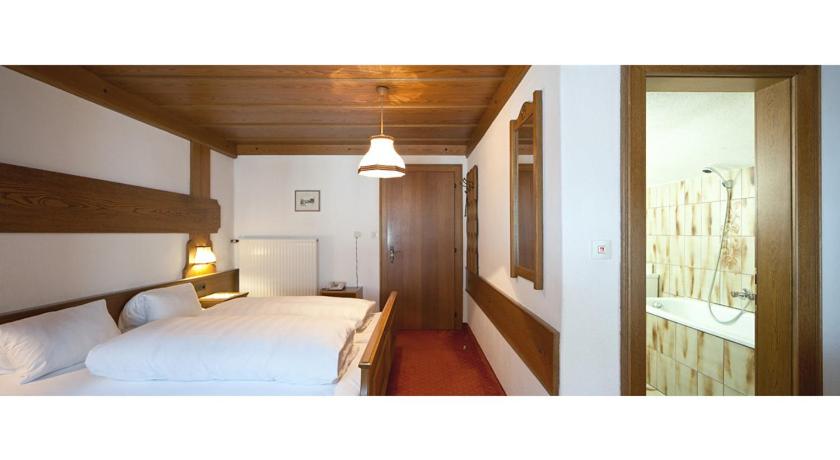 Postel nebo postele na pokoji v ubytování Haus Gamberg