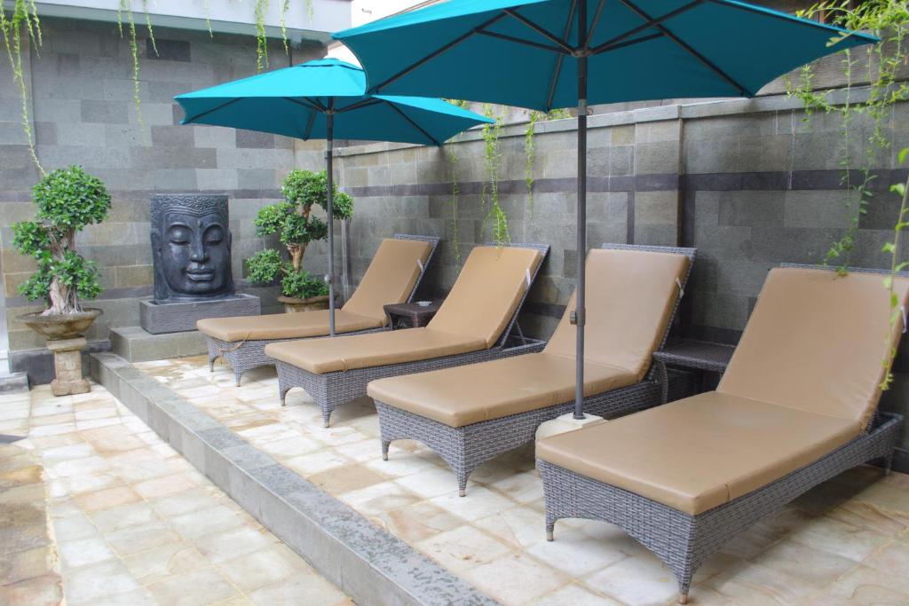 Fotografie z fotogalerie ubytování Flamboyan Hotel v Kutě