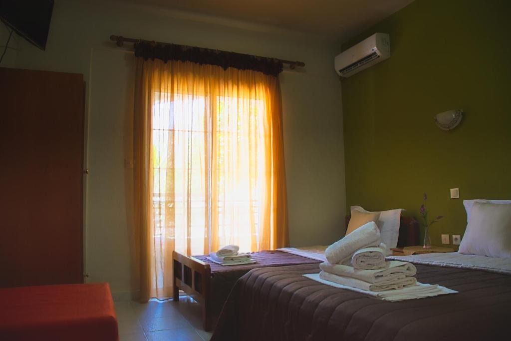 Postel nebo postele na pokoji v ubytování Hotel Barracuda