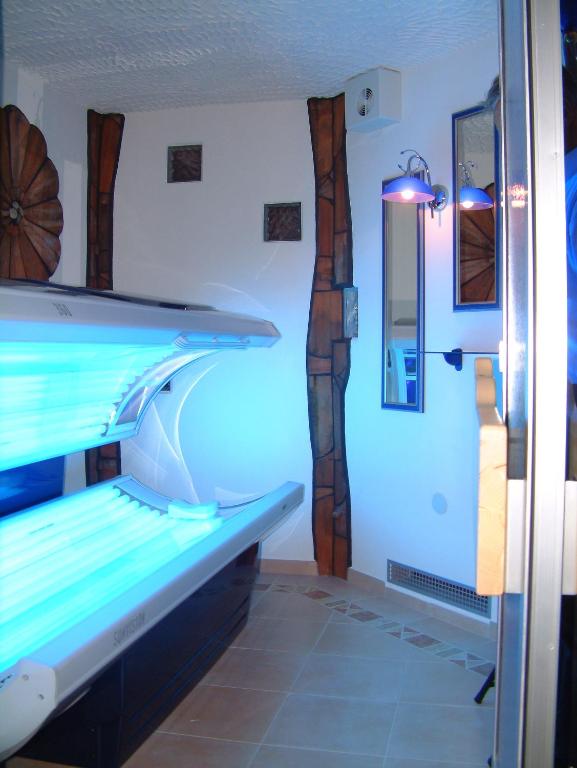 Postel nebo postele na pokoji v ubytování Pension Heidi
