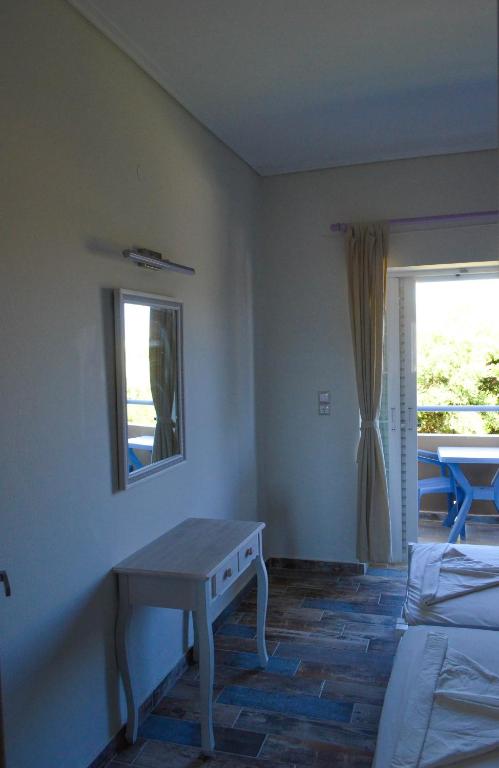 Łóżko lub łóżka w pokoju w obiekcie Sevi Apartments