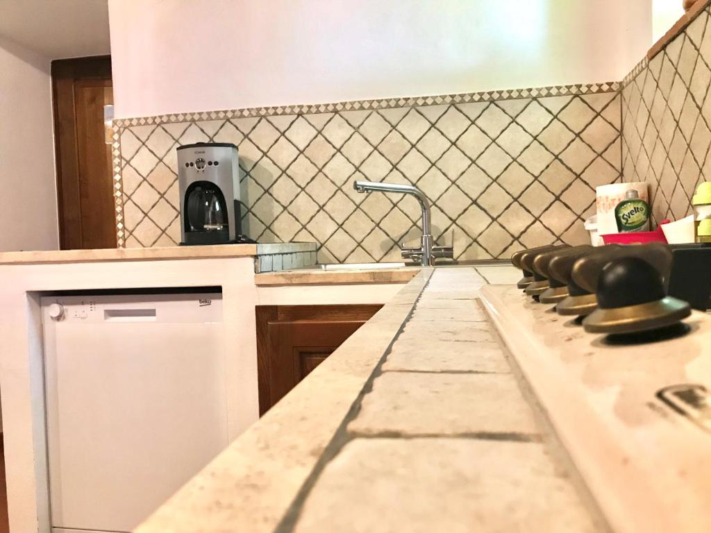 Kuchyň nebo kuchyňský kout v ubytování Agriturismo podere Casano