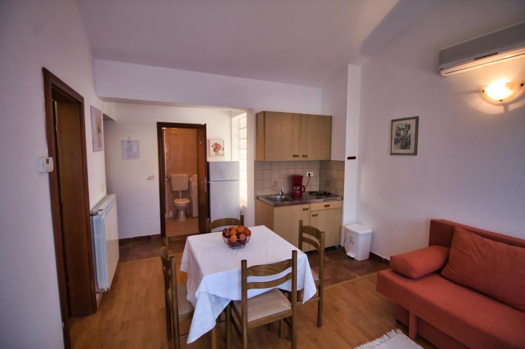 Kuchyň nebo kuchyňský kout v ubytování Apartments SI