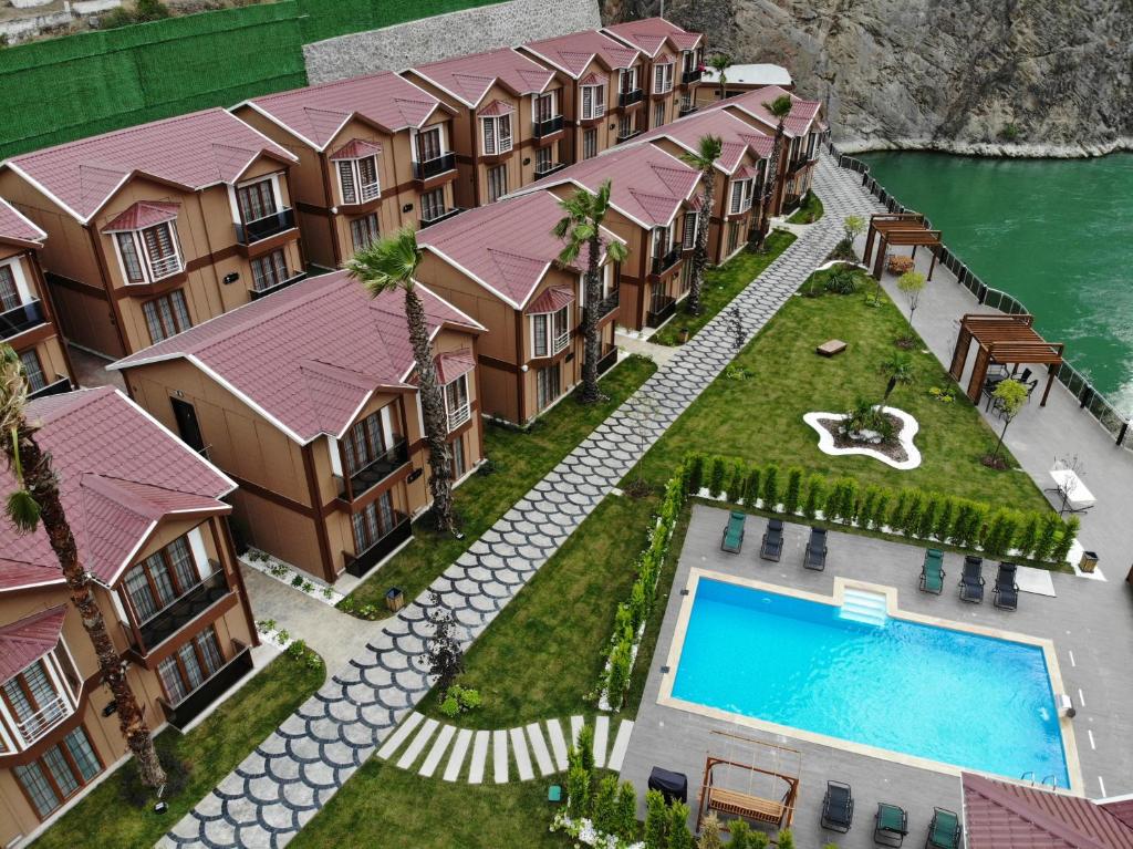 an aerial view of a resort with a swimming pool at villa da butik otel in Artvin