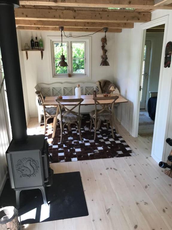 Posezení v ubytování Sommerhus i idylliske omgivelser
