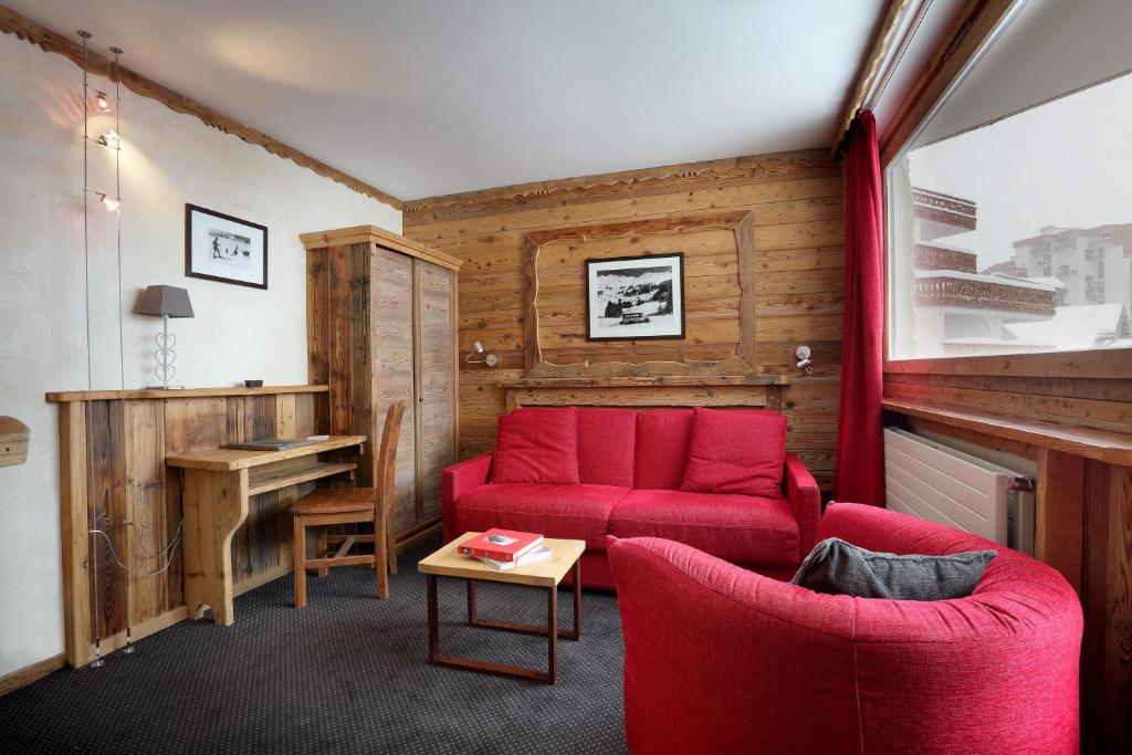 Coin salon dans l'établissement Hotel 3 Vallées Val Thorens