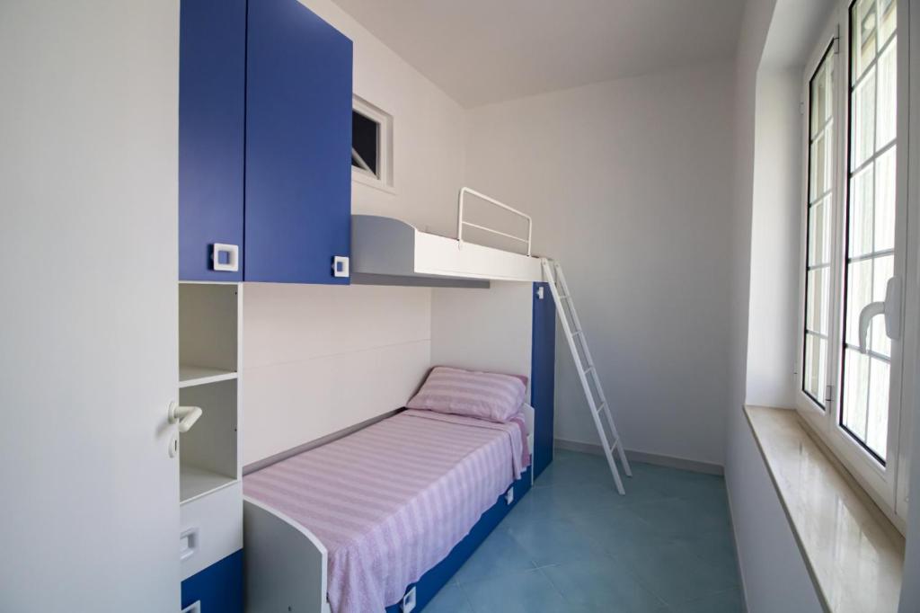 Posteľ alebo postele v izbe v ubytovaní Cielo Azzurro
