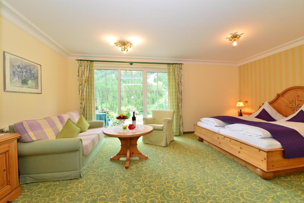 Postel nebo postele na pokoji v ubytování Hotel Garni Ingeborg