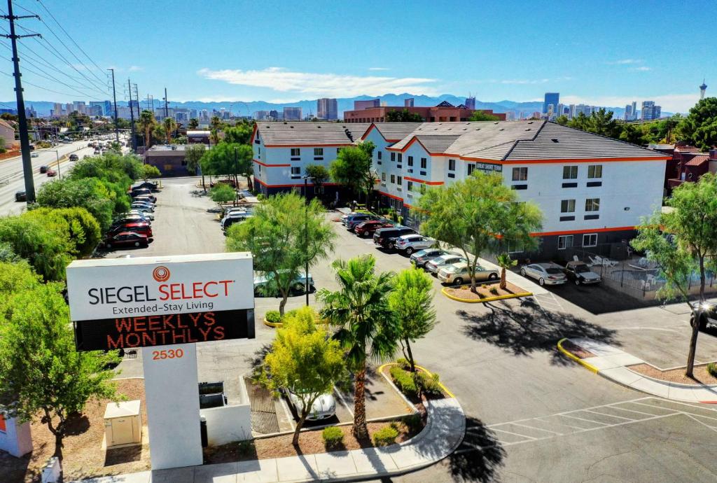 an aerial view of a city with a street with cars at Siegel Select Flamingo in Las Vegas