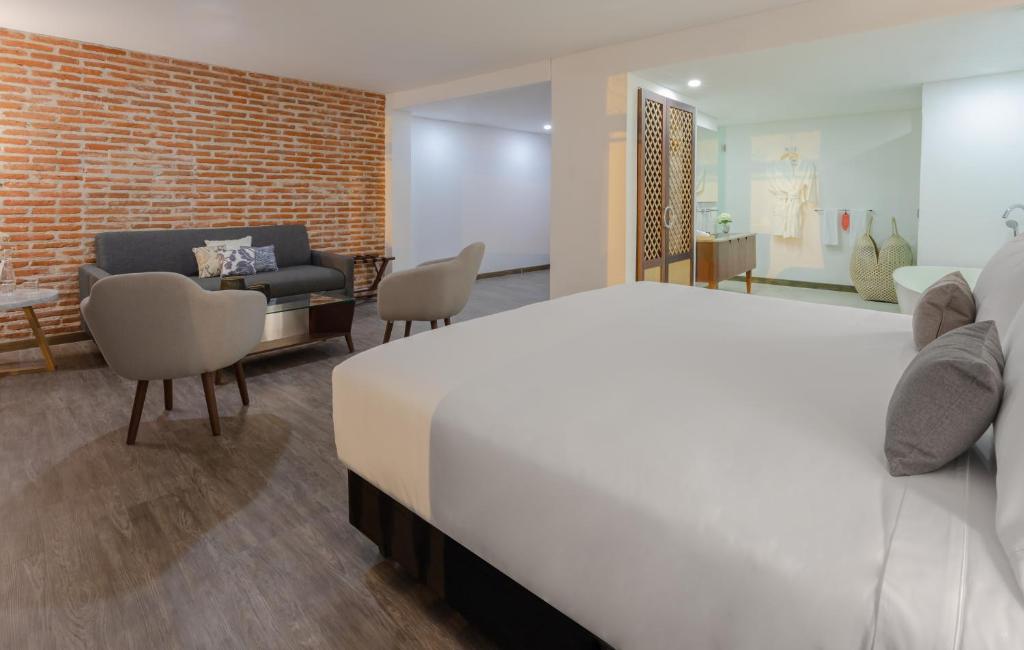 Postel nebo postele na pokoji v ubytování Hotel Santa Catalina