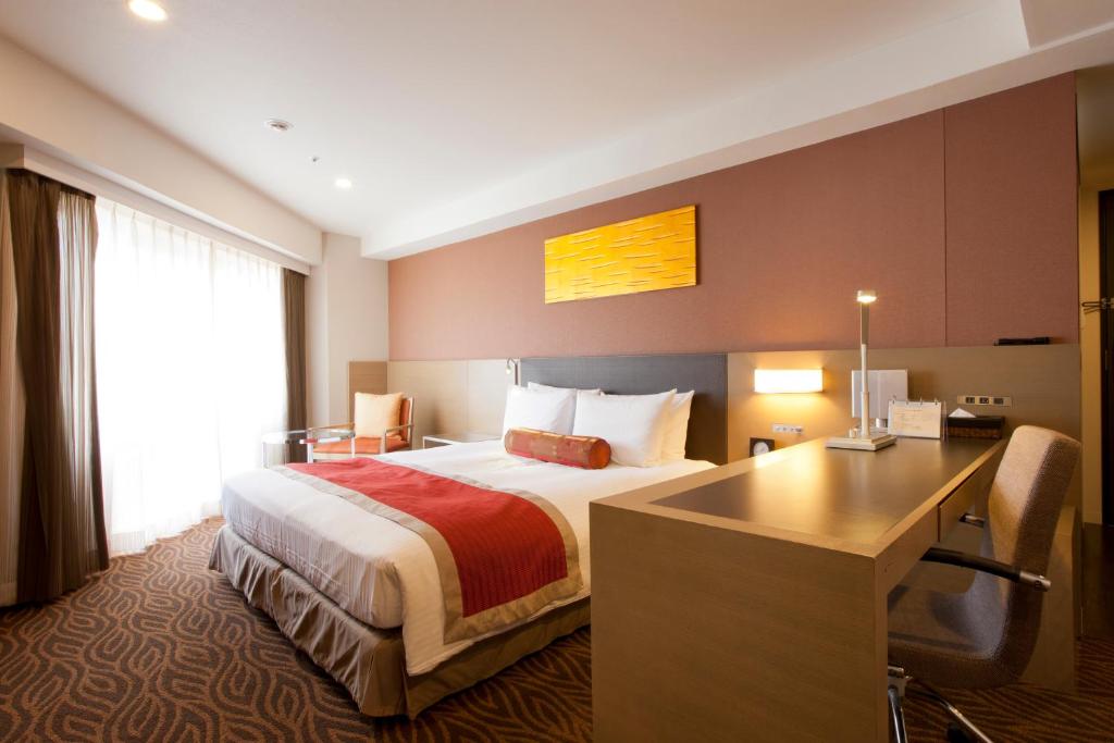 Postel nebo postele na pokoji v ubytování Hotel Sardonyx Tokyo