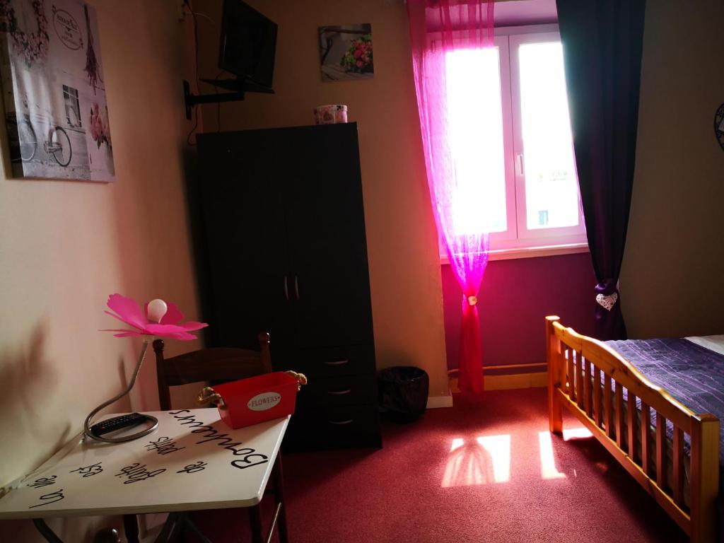 Postel nebo postele na pokoji v ubytování Hotel Ô Fil de L'ô