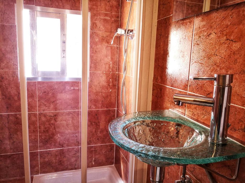 Un baño de Apartamentos Cocó