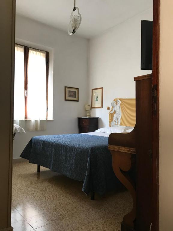 Posteľ alebo postele v izbe v ubytovaní To dream in Siena