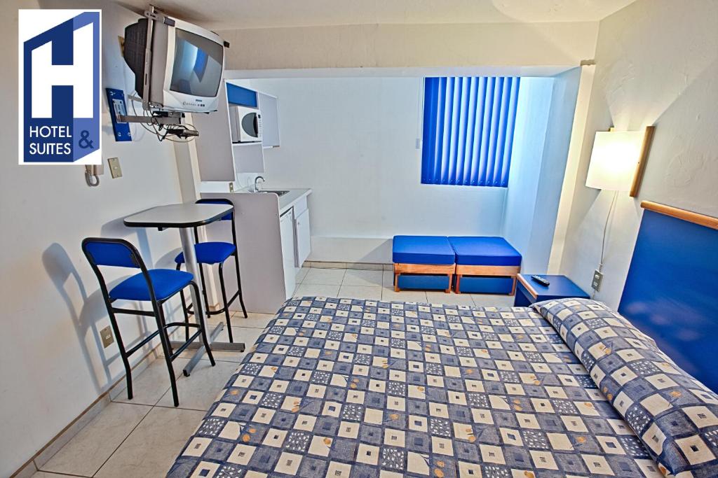 Postel nebo postele na pokoji v ubytování Hotel H Americas