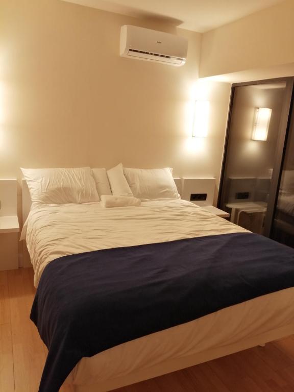 Postel nebo postele na pokoji v ubytování Lamar hotel