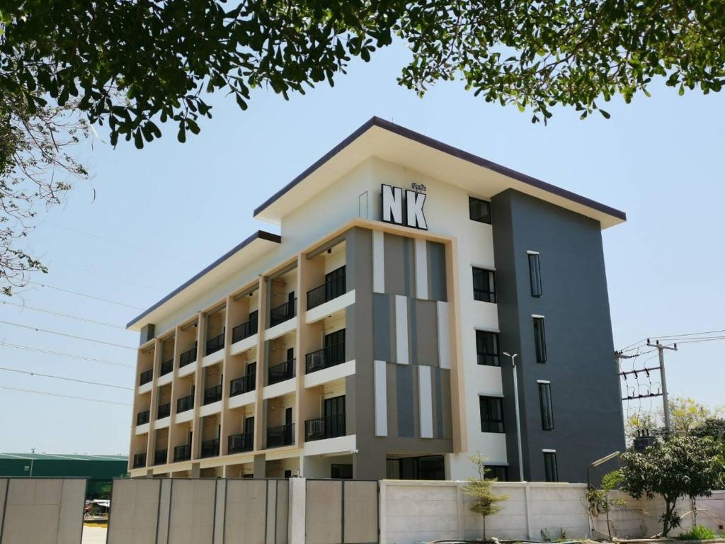 a building with the nk logo on it at NK place Phetchaburi in Ban Nong Som