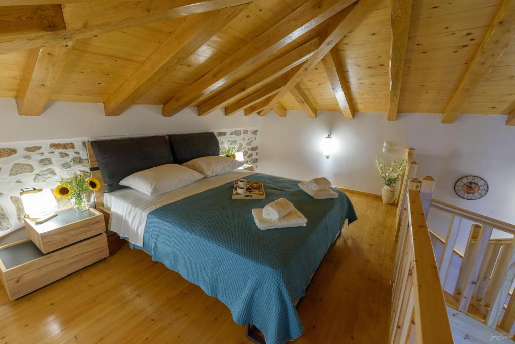 Postel nebo postele na pokoji v ubytování Guarda il porto
