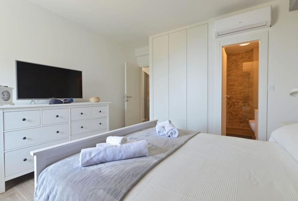 Posteľ alebo postele v izbe v ubytovaní Holiday home Barbarella