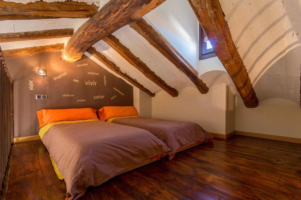 Postel nebo postele na pokoji v ubytování Tiempo de Ensueño